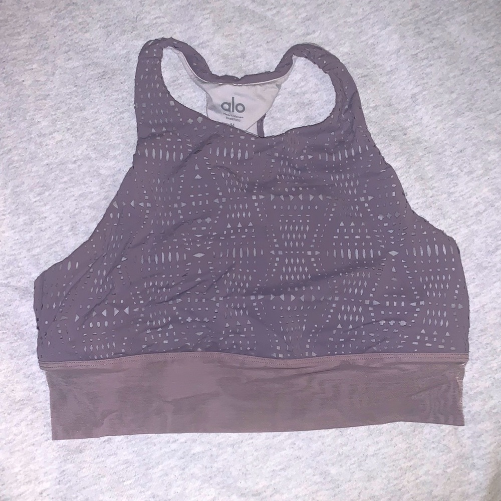 Alo Yoga sports bra in lavender. Cut out design throughout with mesh at bottom